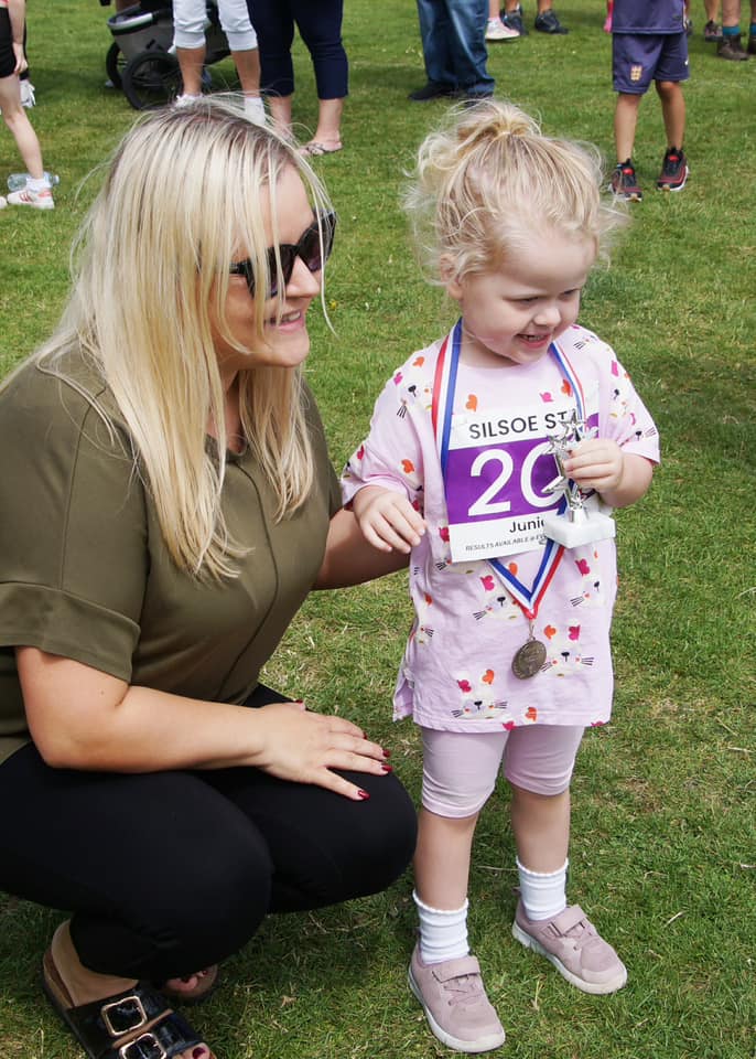 Young finisher with medal