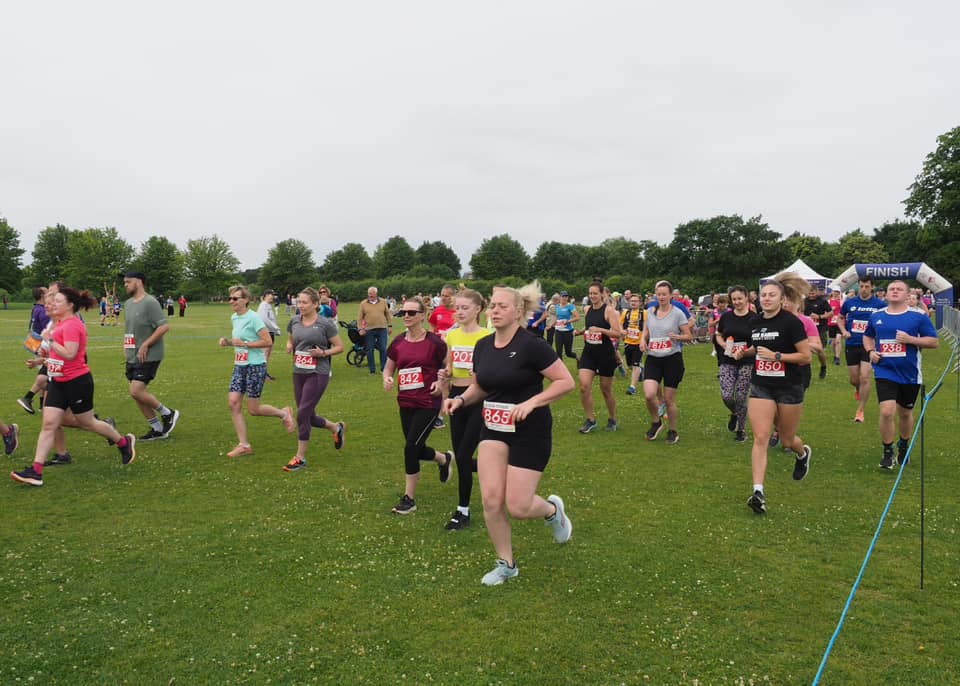 Runners on the farmland course